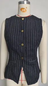 Close-up detail of a dark navy pinstriped sleeveless denim vest with gold buttons