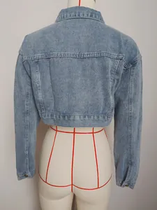 Detailed back view of a stylish light blue vintage cropped denim jacket for women