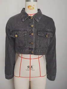 Detailed front view of a vintage washed black cropped denim jacket displayed on a mannequin
