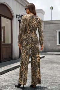 Back view of a trendy leopard print denim jacket and wide-leg trousers set for women