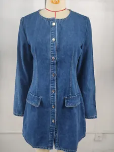 Front view of washed blue denim long sleeve dress with waist-defining fit