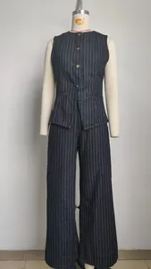 Detailed look at the pinstripe sleeveless denim vest and matching wide-leg trousers set