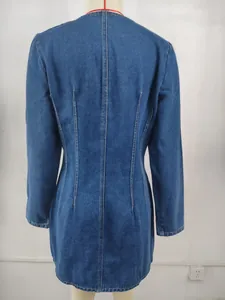 Close-up back view of a stylish waisted long sleeve denim dress with contoured stitching