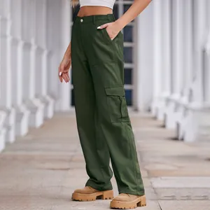 Detailed side view of army green washed cargo pants with flap pockets on a female model