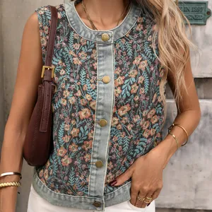 Close-up detail of vintage floral jacquard vest with denim trim and gold buttons