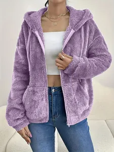 Close-up of a soft purple hooded fleece jacket with zipper and pockets for women