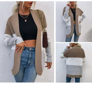 Vista dettagliata multi-angolo del cardigan in maglia color-block con grandi tasche