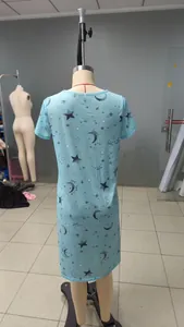 Detail back view of light blue short sleeve nightgown with moon and star print