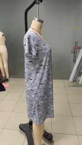 Side view detail of light blue nightgown with coffee mug and heart patterns on a mannequin