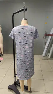 Detailed back view of a grey short-sleeved nightgown with coffee-themed prints on a mannequin