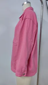 Detailed side view of a vintage style pink loose fit denim jacket on a mannequin