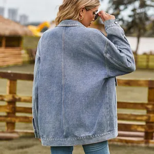 Back view of a loose vintage denim jacket with vertical seam details