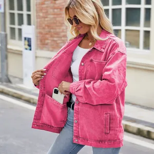 Detail of vintage washed pink denim jacket showing a practical large inner pocket