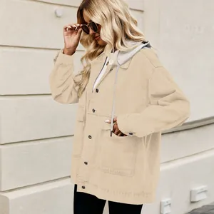 Detailed side view of a vintage loose beige denim jacket for women featuring a grey hood