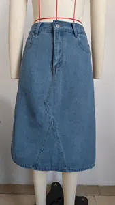 Classic washed blue denim midi skirt with unique front seam detail on mannequin