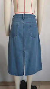 Back view of a washed blue denim midi skirt featuring dual pockets and a center slit