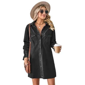 Loose-fit washed black denim shirt dress for women with long sleeves and front buttons.