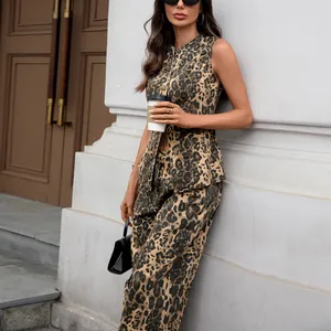 Full body shot showing the fit and leopard print detail of the sleeveless denim set.