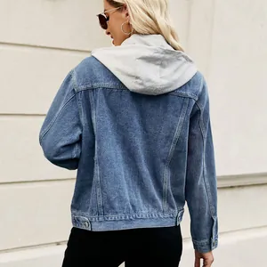 Detailed back view of a washed blue denim jacket with integrated grey fabric hood