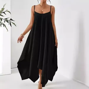 Detail view of a black backless maxi dress featuring a loose fit and asymmetrical hemline