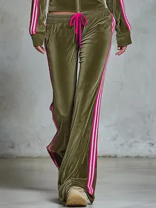 Women's olive green velvet tracksuit set featuring pink and white side stripes