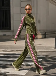 Elegant olive green velvet tracksuit set with pink side stripes for fashionable women