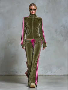 Chic olive green velvet tracksuit set for women featuring zip-up jacket and wide-leg pants.