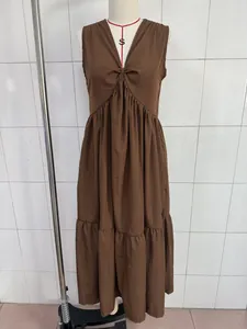 Elegant brown sleeveless V-neck maxi dress for summer casual wear on a mannequin