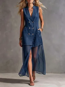 Detail view of sleeveless denim patchwork dress with elegant tulle skirt and V-neck.