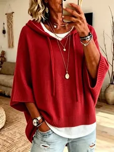Women's casual red hooded knit sweater featuring drawstrings and a layered look