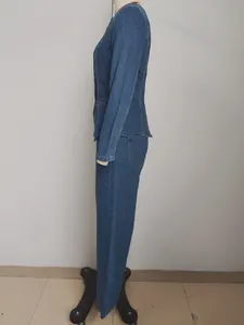 Side view detail of a classic blue washed denim jacket and trousers set on a mannequin