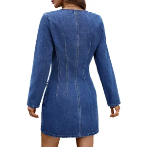 Chic long-sleeved denim mini dress in washed blue with a fitted waist-defining silhouette