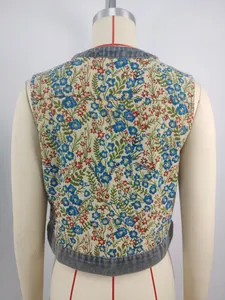 Detailed back view of retro floral jacquard sleeveless vest with blue denim trim details