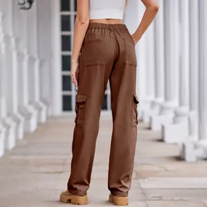 Back view of brown washed denim cargo pants with elastic waist and side flap pockets