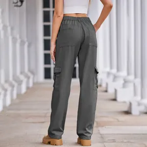 Back view of premium women's dark grey washed denim cargo pants with elastic waist pockets
