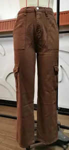 Women's brown washed denim cargo pants with large side pockets and high waist.