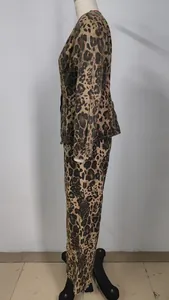 Side view of a leopard print washed denim jacket and trousers set on a mannequin.