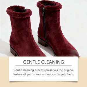Detailed close-up of burgundy suede boots with fur trim showing gentle cleaning result