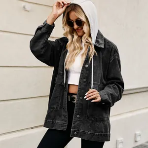 Stylish oversized retro denim jacket with grey hood for women in casual outdoor setting