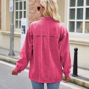 Back view detail of a vibrant washed pink denim jacket for women with oversized fit