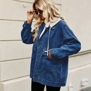 Detailed macro view of women's retro loose denim jacket featuring a grey drawstring hood