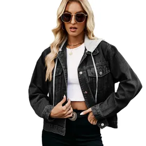 Women's slim fit washed black denim jacket featuring a grey hood displayed on model