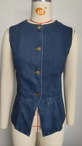 Detail view of washed blue denim sleeveless vest with vintage metal buttons