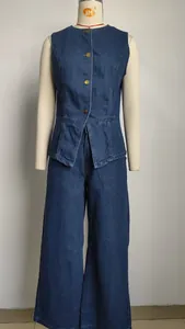 Detailed view of stylish washed blue denim sleeveless vest and wide-leg trousers set.