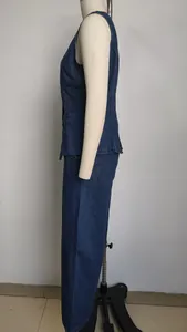 Side view of washed denim sleeveless vest and pants set on a mannequin