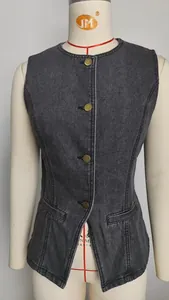 Detailed view of a washed gray denim vest featuring a round neck and metallic buttons