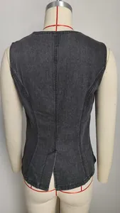 Detailed back view of a slim-fit washed black denim sleeveless vest on a mannequin