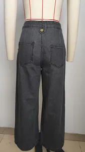Back view detail of high-waisted washed dark grey wide-leg denim pants on mannequin