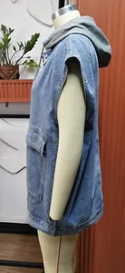 Side view of women's sleeveless denim hooded vest featuring a large functional front pocket