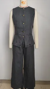 Frontal view of a grey washed denim two-piece set featuring a sleeveless vest and pants